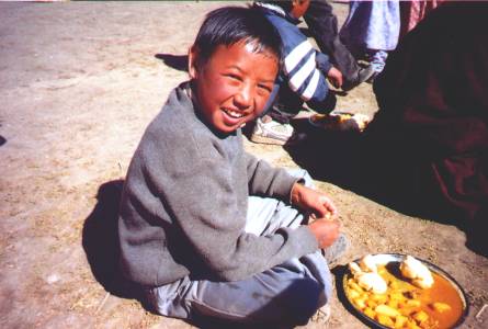 Potatoes and dumplings will stick to this boy's ribs!