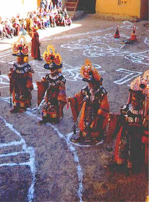 Buddhist symbols cover the gompa's courtyard.