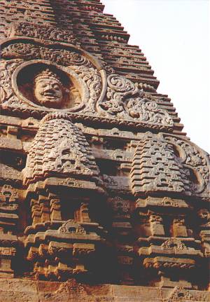 Shiva gazes out from each side of the temple.