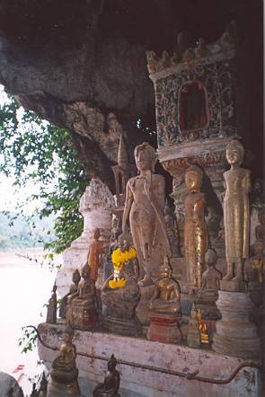 The cave's huge opening above the Mekong and the hundreds of Buddha statues inside give Pak Ou a strong spiritual presence.