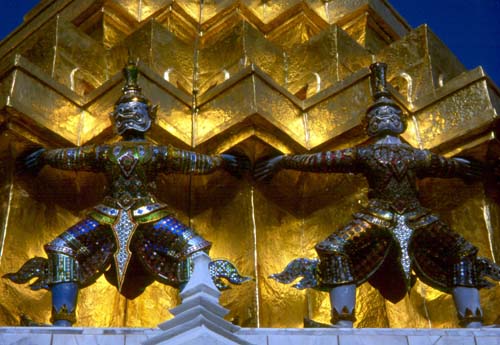 These glittering guardians wrap around a chedi in front of the Royal Pantheon.