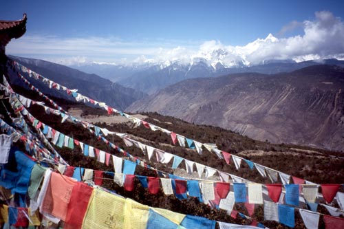 This viewpoint above Deqin had many prayer flags and small chedis.
