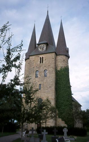 The unusual three-steepled tower dates back to ca. 1100.